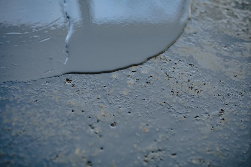 A photo of grey epoxy spread over concrete