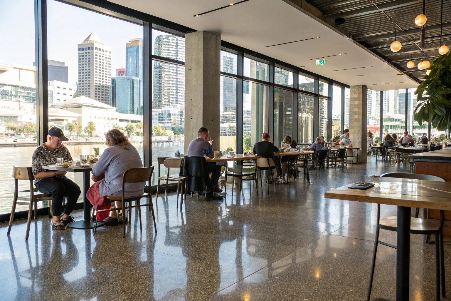 Beautiful polished concrete overlay floors in a modern Brisbane café showing durability and aesthetic appeal